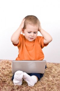 Frustrated child with computer