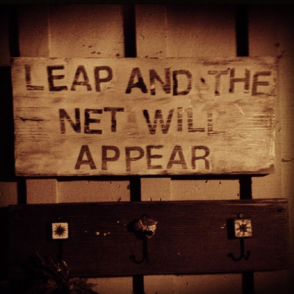 Sign reading "Leap and the net will appear"