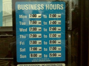 Business Hours from store window
