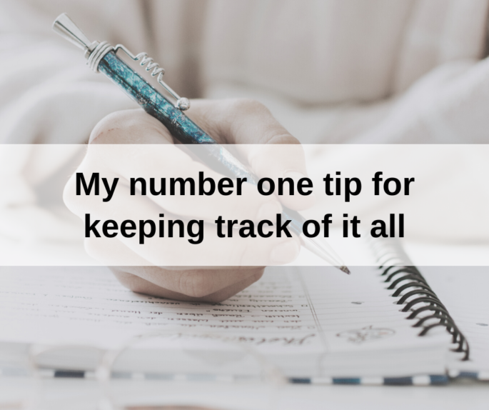 background image of woman writing in notebook. Text on top says "My number one tip for keeping track of it all"